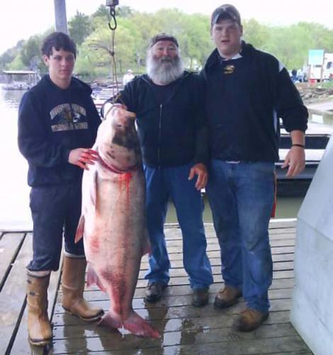 Photo of Gene Swope and grandsons with record bighead carp